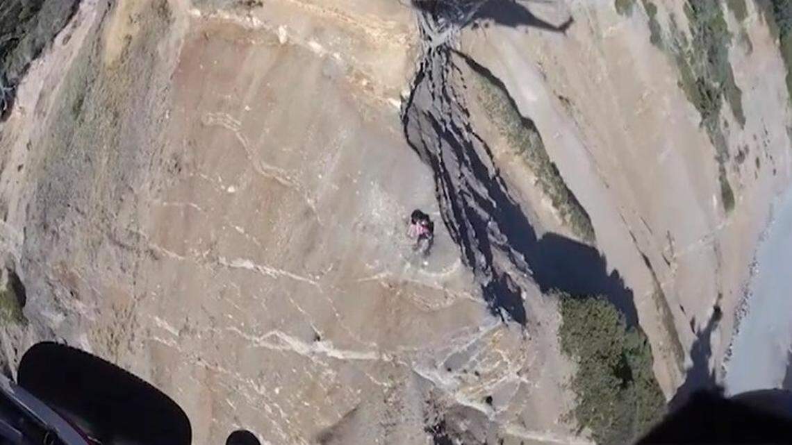 The two 14-year-olds were flown to a nearby beach and reunited with their families.