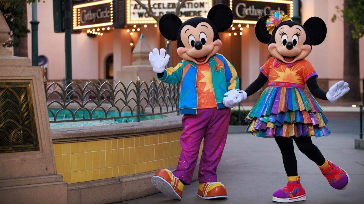 Mickey and Minnie Mouse will appear on Buena Vista Street in new costumes celebrating the 25th anniversary of Disney California Adventure, starting Feb. 6 for a limited time.