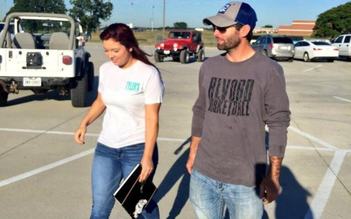 Brittany Gayler is walked to school by her father, Jason, on her last day.