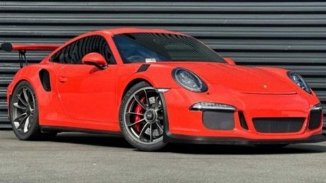 Accused thieves drove two Porsches, including this one, worth $500,000 through showroom windows at a Fremont dealership, California police say.