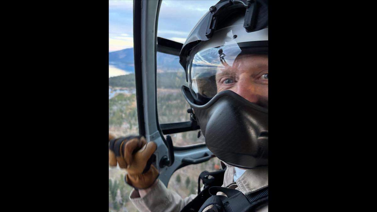 A California Highway Patrol helicopter hoisted a climber stranded on a ledge near Lake Tahoe to safety, rescuers said.