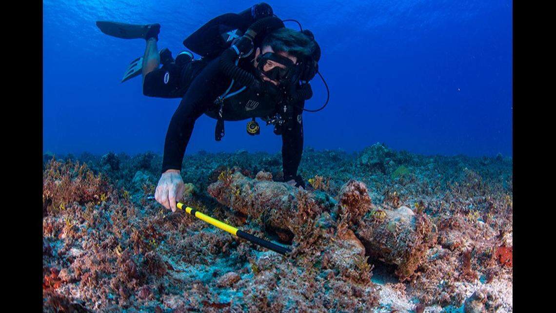 A large mortar rests in 170 feet of water off of Guam’s Asan Beach, one of many unexploded ordnance found around the World War II landing beaches, researchers said.