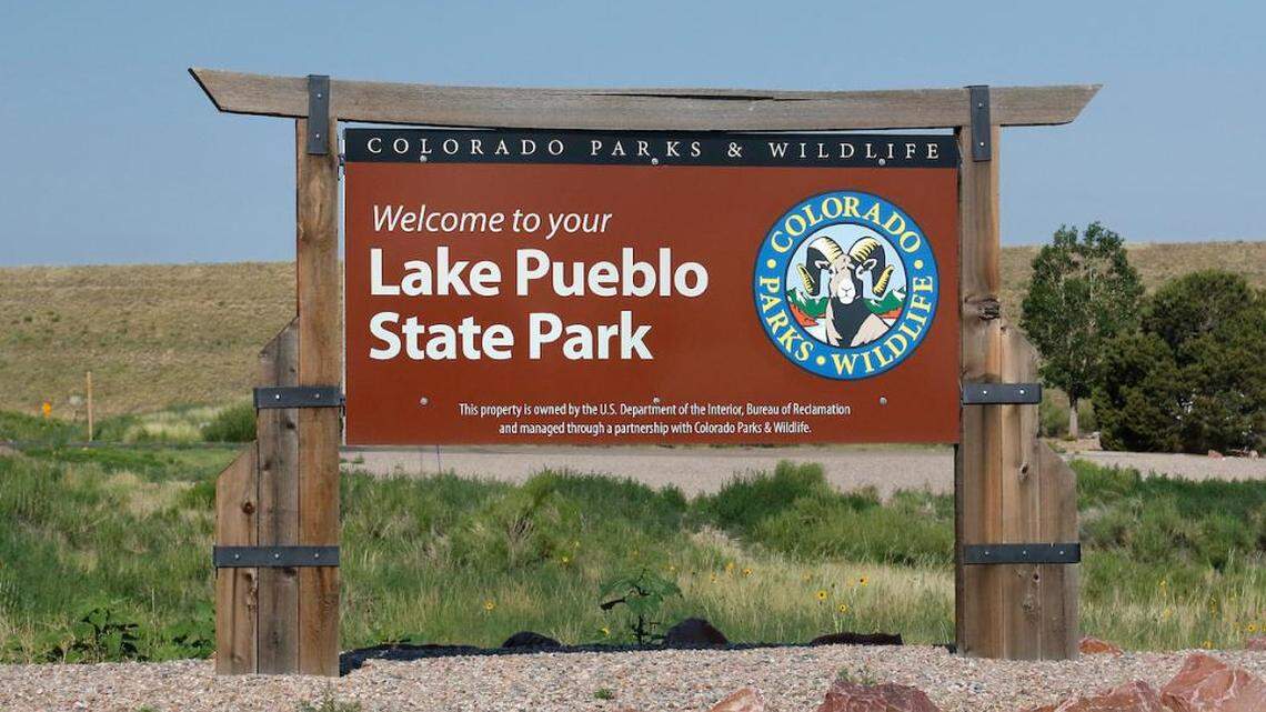 A father died while trying to save two of his kids and their friends that were swimming in rough waters on a frigid Colorado lake, officials said.