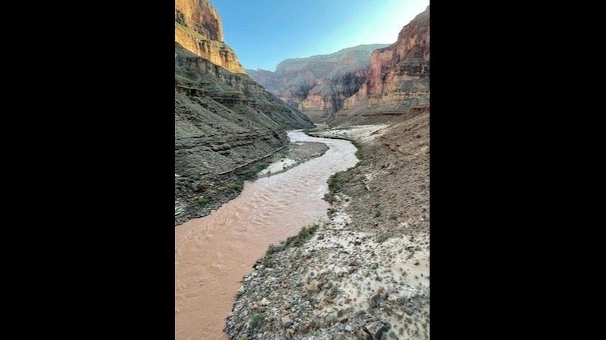 A man died after his boat flipped near Fossil Rapid, rangers say.