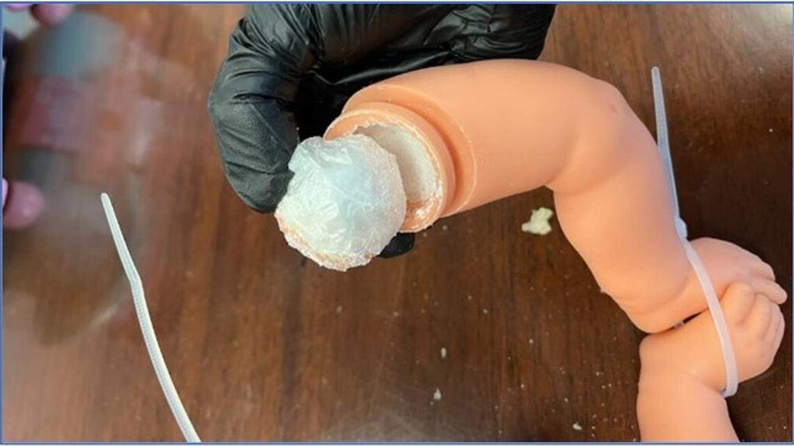 Five people are accused of running a California smuggling ring shipping meth inside dolls and hollow books, federal officials say.
