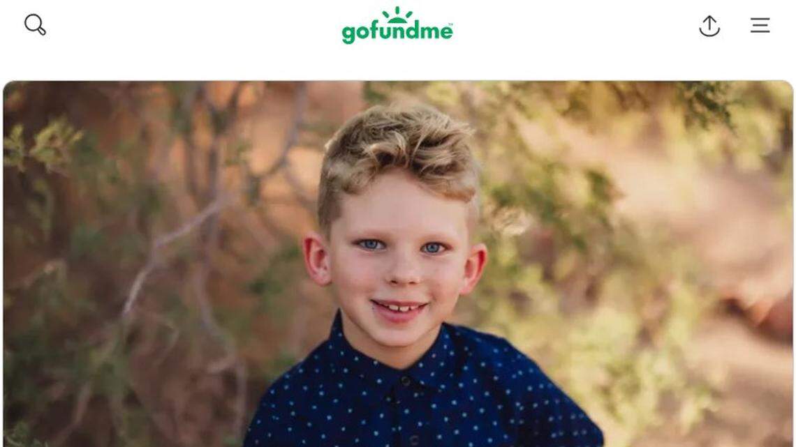 A 9-year-old boy waiting to cross a Chandler street with his father was hit by a vehicle and died, Arizona police say.