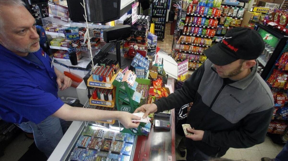 Lottery tickets are sold at a store in Portland, Ore. A veteran in Oregon said he recently won money from a scratcher left on his car.