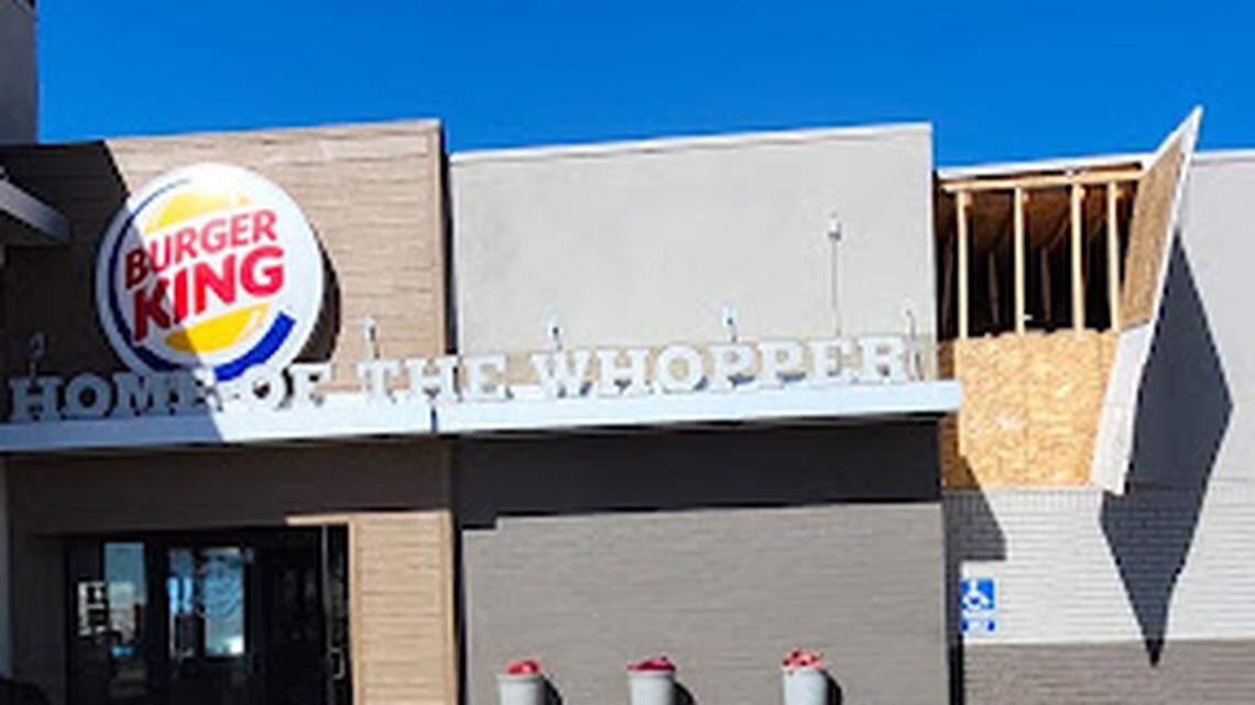 The man kicked a hole in the restaurant’s exterior wall while hiding in the ceiling, police say.