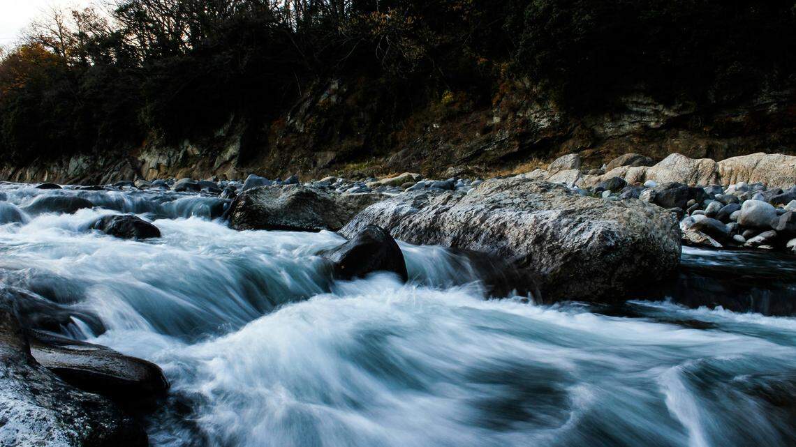 A 59-year-old woman vanished after being swept away while crossing a river in the Angeles National Forest, California rescuers say.