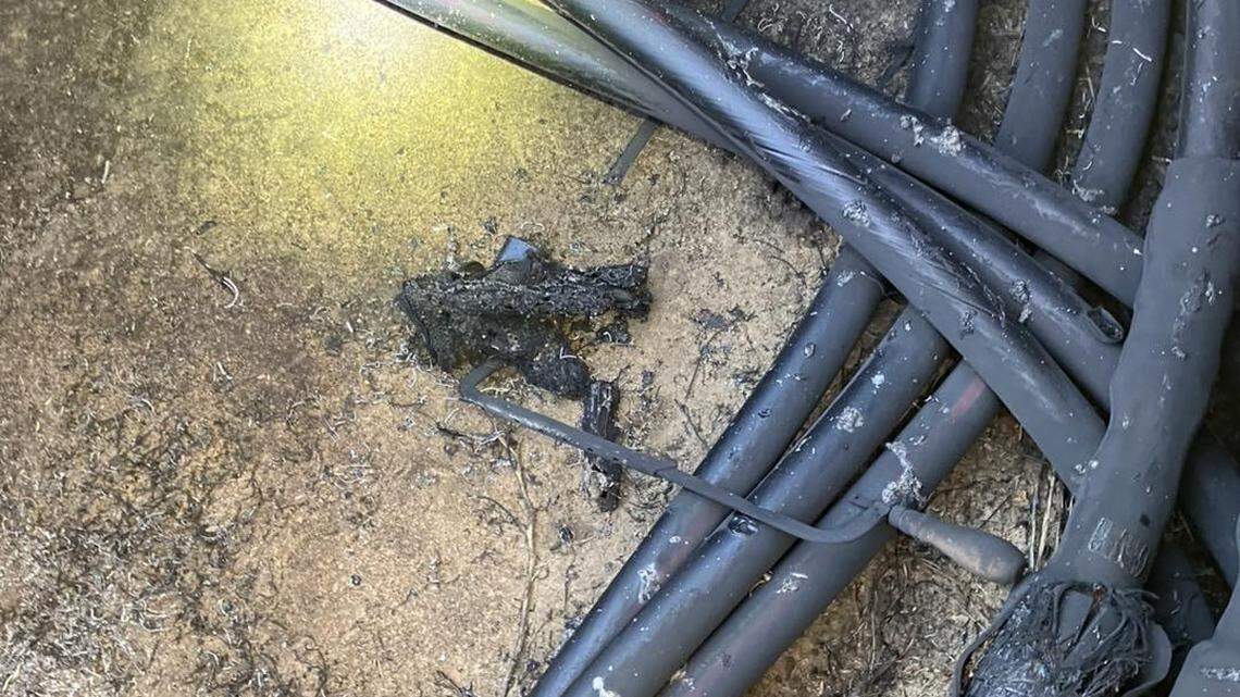 Power crews investigating an outage at 5 a.m. Thursday, Dec. 12, found the scorched items, including a melted hacksaw, police said.