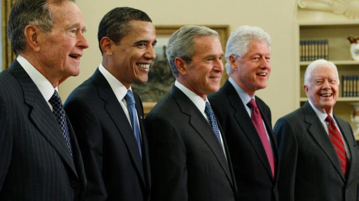 President George W. Bush, center, poses with President-elect Barack Obama and former presidents, from left, George H.W. Bush, left, Bill Clinton and Jimmy Carter, right, on Jan. 7, 2009, in Washington. Now all former commanders in chief, they’ve teamed for hurricane relief.