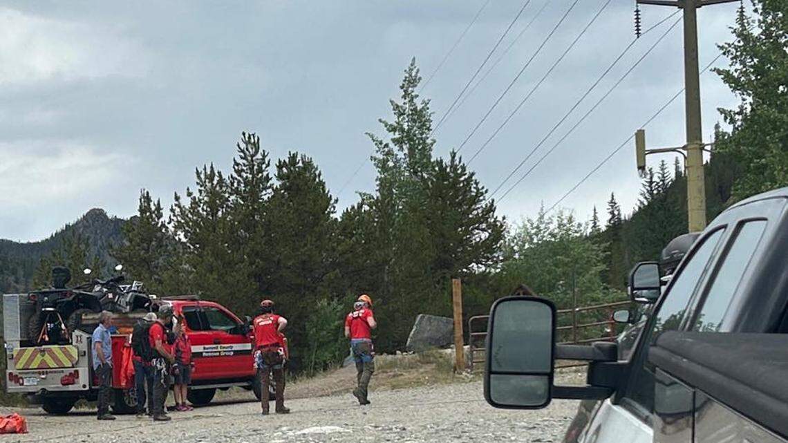 Two climbers were stranded in a Colorado gulch after the person carrying most of their climbing gear fell to their death, officials said.