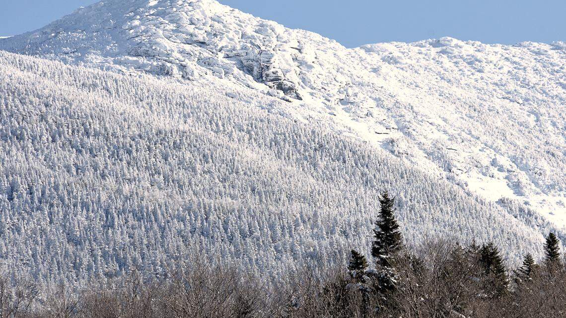 Mount Carrigain is a mountain peak within the White Mountains in New Hampshire. Mount Lafayette is also part of the mountain range, and it’s pictured.