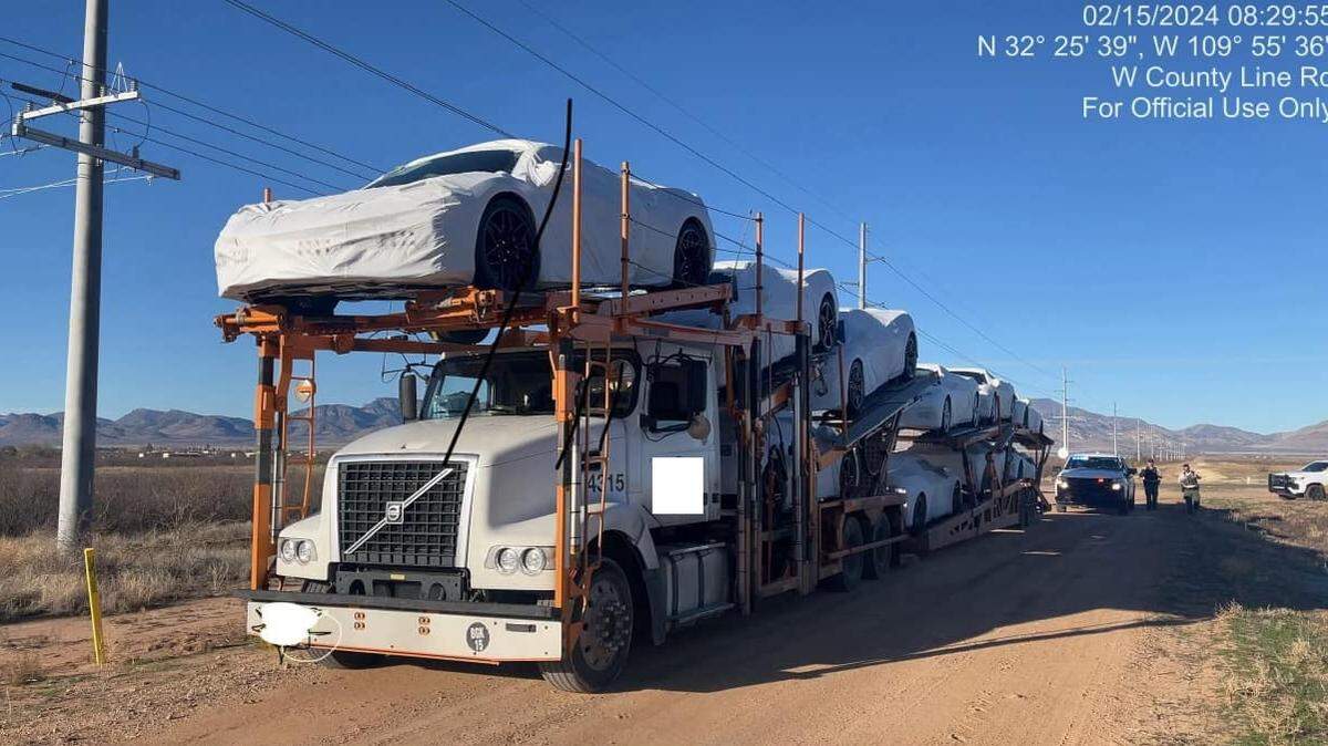 A man stole a truck hauling 10 high-end sports cars, authorities said.