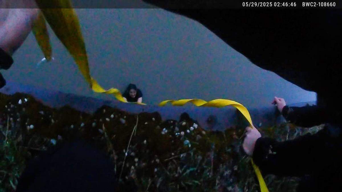 A state trooper rescued a man stuck in frigid river in Alaska, officials said.