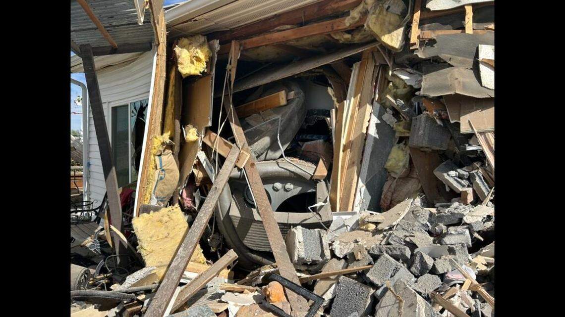 A semi crashed into a Utah home and two people inside were injured, officials said.