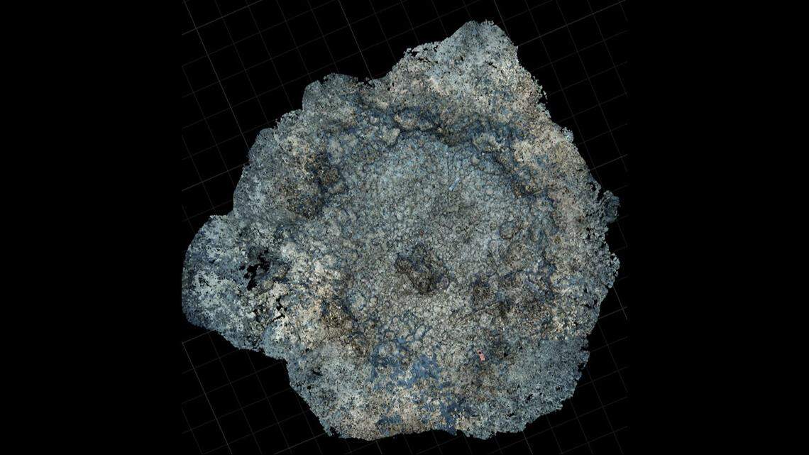 This is a crater created by a U.S. underwater demolition team blast to remove a Japanese obstacle on the reef flats of Asan Beach at Guam.