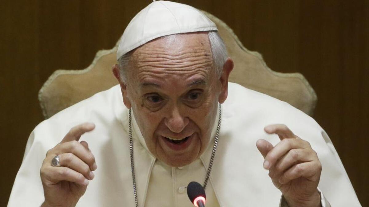 
Pope Francis delivers her speech in the Synod Hall during a conference on Modern Slavery and Climate Change at the Vatican, Tuesday, July 21, 2015.
