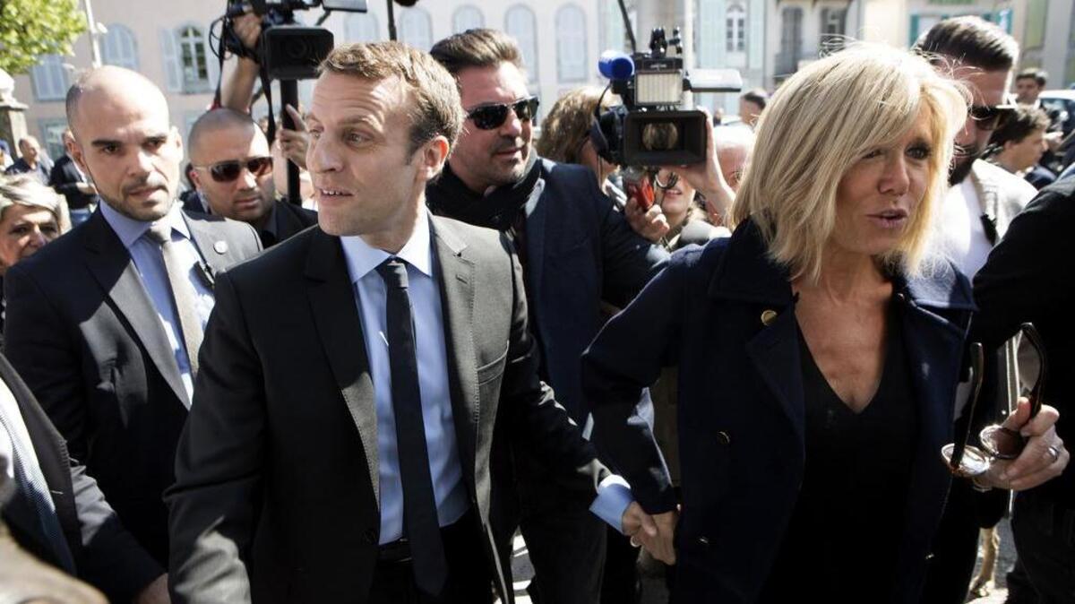 President-elect Emmanuel Macron of France and his wife, Brigitte, on the campaign trail in the south of France in April. Brigitte Macron, who is 24 years older than her husband, is already stirring a lively and erudite debate about sexism, ageism, masculinity, contemporary marriage, political stagecraft and what a modern French first lady should actually be.