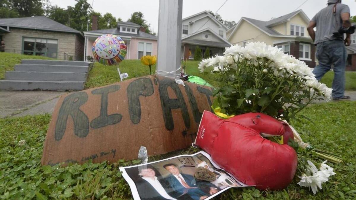 A small memorial sits in front of the boyhood home of Muhammad Ali on Saturday, June 4, 2016, in Louisville Ky. Ali, the magnificent heavyweight champion whose fast fists and irrepressible personality transcended sports and captivated the world, died Friday, June 3, 2016. He was 74.