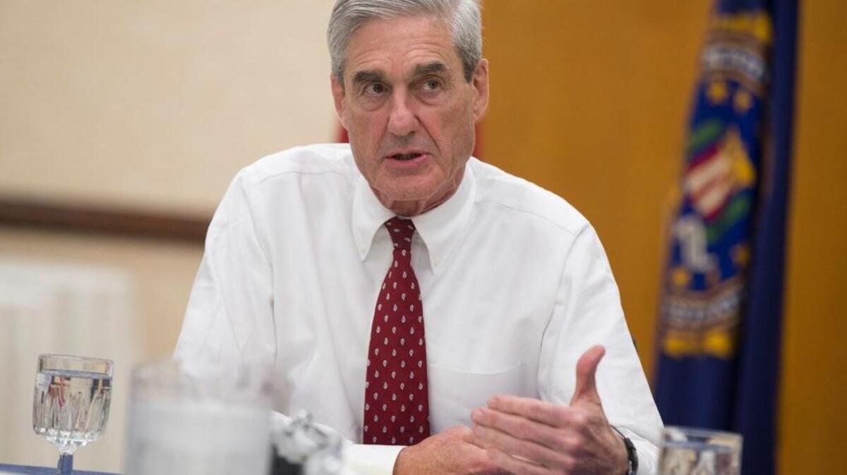 Outgoing FBI director Robert Mueller speaks during an interview at FBI headquarters on Aug. 21, 2013, in Washington.