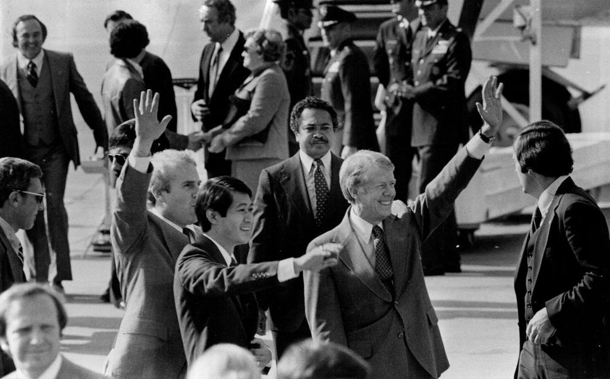 President Jimmy Carter deplanes at McClellan Air Force Base in Sacramento on Nov. 3, 1978. He was in town to give a boost to Democratic office seekers Vic Fazio, center left, Robert Matsui, and Lt. Gov. Mervyn Dymally.