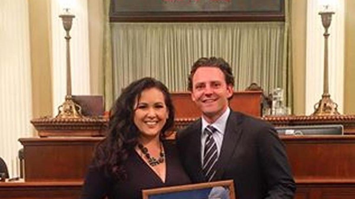 A photo posted to Nathan Fletcher’s Facebook page shows the former Assemblyman receiving his Veteran of the Year award from Assemblywoman Lorena Gonzalez, D-San Diego, whom he is dating.