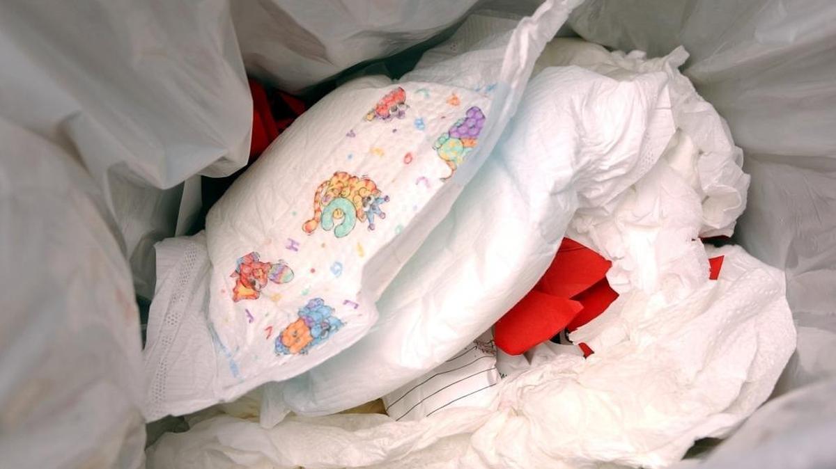 Dirty diapers in a pail waiting for disposal at the Kids World Learning Center in Rancho Cordova on February 14, 2003.