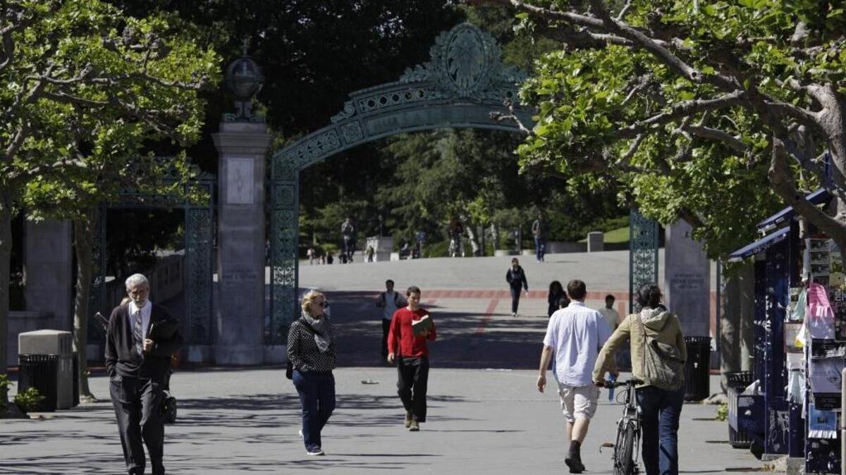 People walk through Sproul Plaza near Sather Gate on the University of California, Berkeley, campus on June 1, 2011.