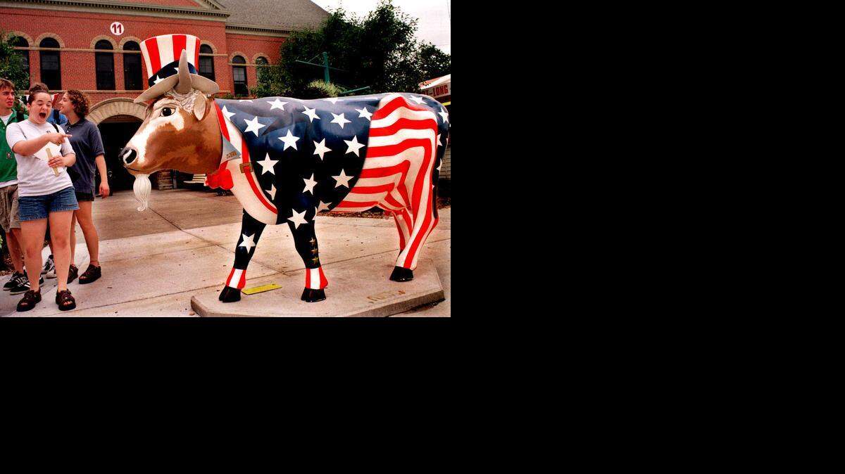 
Fairgoers enjoy "Uncle Sam” at the 147th Illinois State Fair in 1999. The exhibition was part of the first American “CowParade,” sponsored by the City of Chicago.
