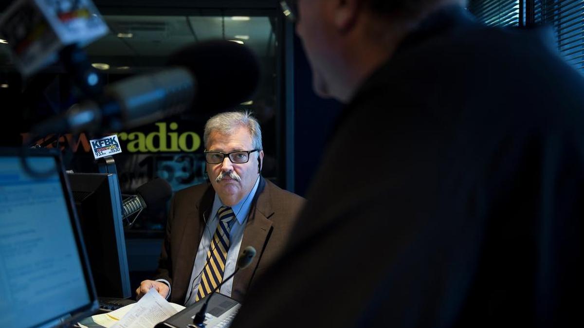 
Former Sacramento County Sheriff John McGinness talks during his radio show with Ryan Harris at KFBK on Aug. 17 in Sacramento. McGinness said he wants his show to feel like a coffeehouse conversation with friends.
