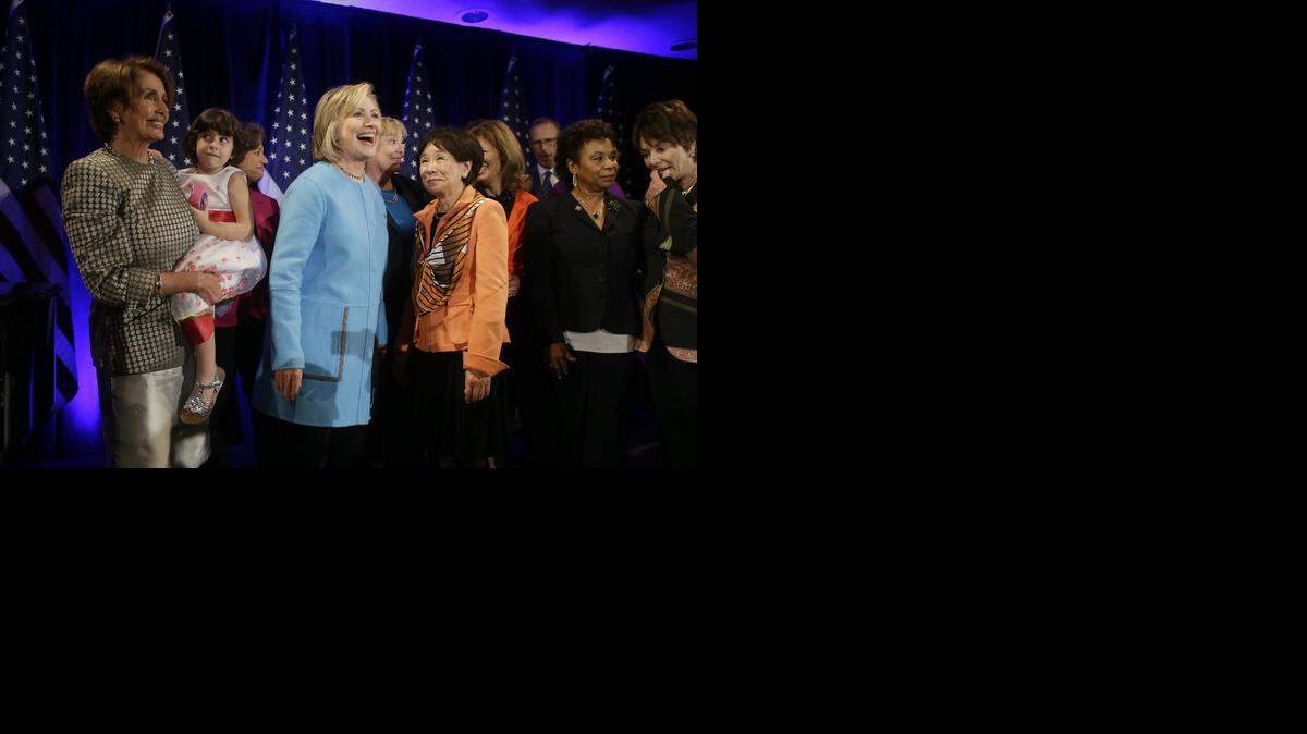 
Former U.S. Secretary of State Hillary Rodham Clinton gathers with House Minority Leader Nancy Pelosi, left, Rep. Doris Matsui, right, and other Bay area congresswomen after speaking at a fundraiser for Democratic congressional candidates hosted by Pelosi at the Fairmont Hotel Monday, Oct. 20, 2014, in San Francisco. 
