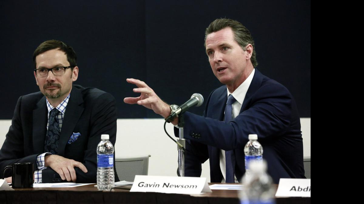 
Lt. Gov. Gavin Newsom speaks during a public forum on his Blue Ribbon Commission on Marijuana Policy at UCLA in April. At left is David Ball, associate professor at Santa Clara University School of Law.
