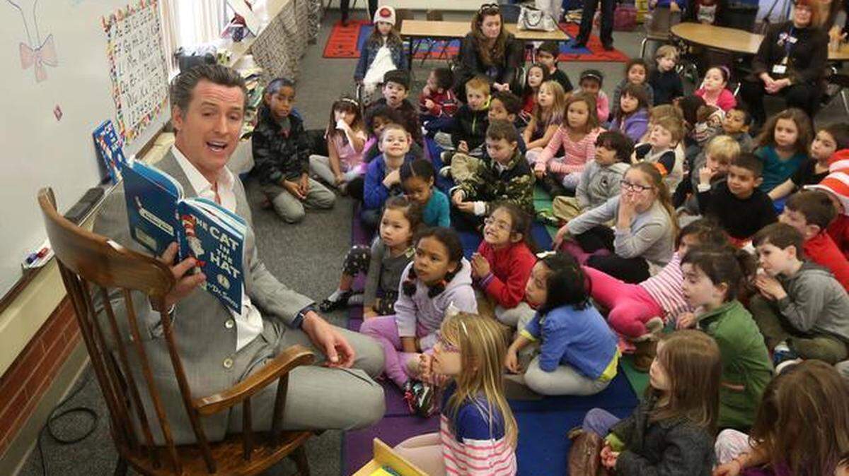
Participating in Read Across America Day, Lt. Gov. Gavin Newsom reads “The Cat In the Hat” to kindergartners at Sierra Oaks K-8 school in Sacramento on Monday, March 2, 2015. 