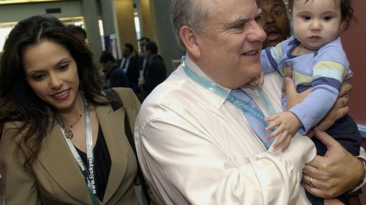 State attorney general Bill Lockyer holds his child, Diego, as he enters the Democratic Convention in San Jose with his wife Nadia on Saturday, January 17, 2004.