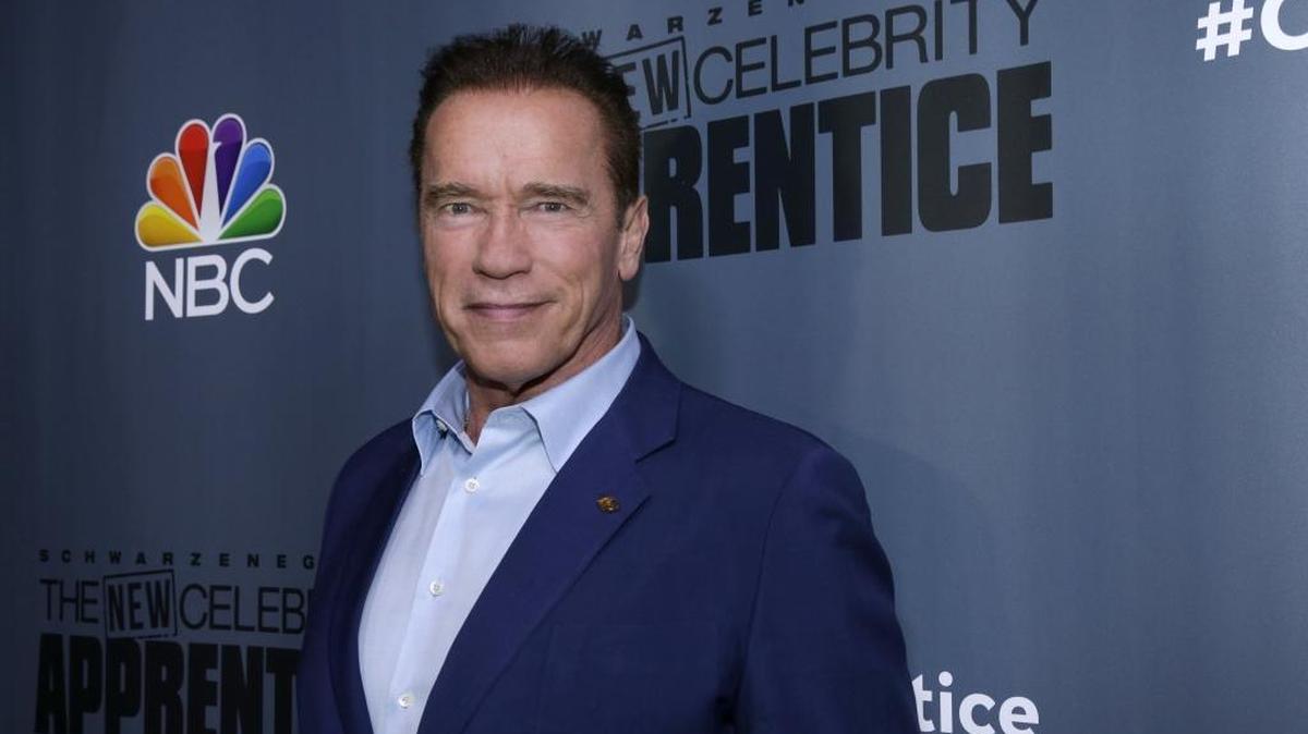 This Dec. 9, 2016 image released by NBC shows Arnold Schwarzenegger, the new boss of “The New Celebrity Apprentice,” at a press junket in Universal City, Calif.