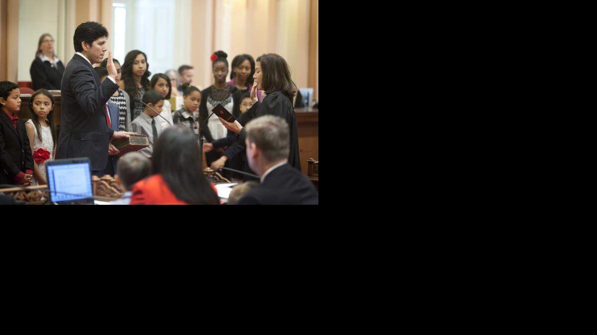 
Sen. Kevin de Leon, D-Los Angeles, is sworn in as the new president pro tem of the Senate by Chief Justice Tani G. Cantil-Sakauye on Dec. 1.
