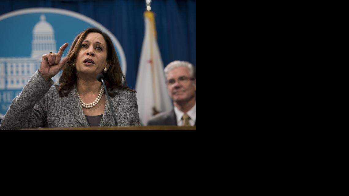 Attorney General Kamala Harris is tasked with drafting a title and 100-word summary of ballot measure proposals. Despite anger over a plan that authorizes the killing of gays and lesbians by “bullets to the head,” legal experts say she has little choice but to let the process continue.
