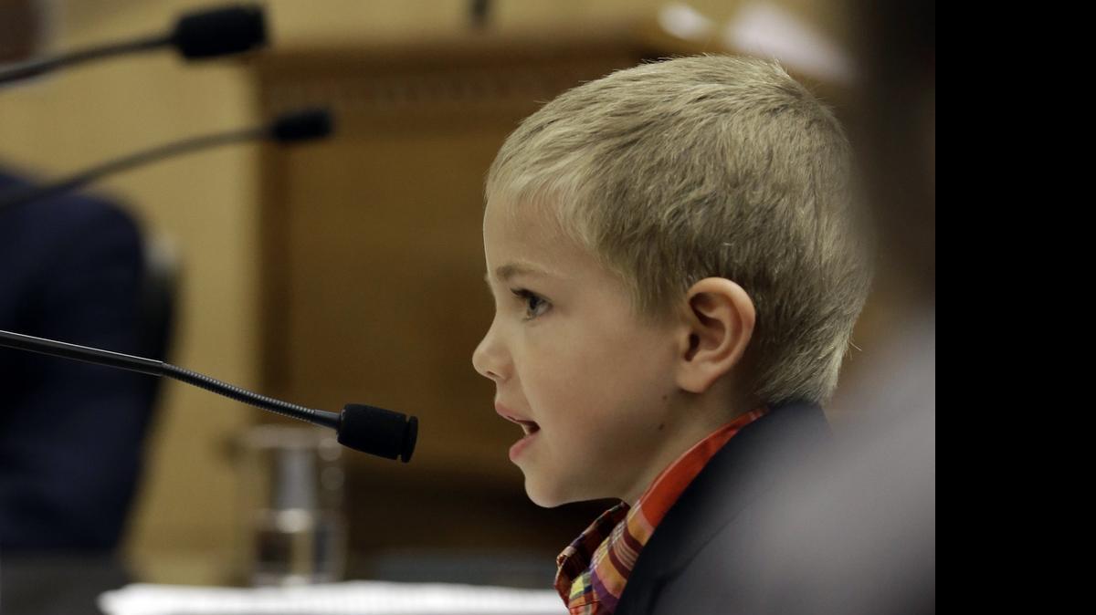 
Rhett Krawitt, 6, who could not be vaccinated while he was being treated for leukemia, speaks to lawmakers about approval of a measure requiring California schoolchildren to be vaccinated during a hearing of the Senate Education Committee on April 15, 2015.
