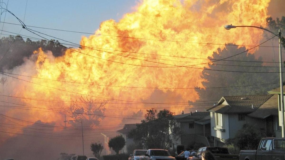 
In this Sept. 9, 2010 file photo, a massive fire roars through a mostly residential neighborhood in San Bruno, Calif. Legislation that would prohibit PG&E from taking a tax writeoff on a $1.6 billion penalty related to the blaze failed Thursday in the state Senate.
