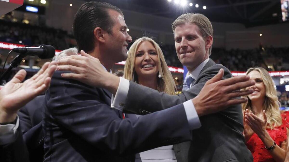 Republican Presidential Candidate Donald Trump's children Donald Trump, Jr., Ivanka Trump, and Eric Trump celebrate on the convention floor during the second day session of the Republican National Convention in Cleveland, Tuesday, July 19, 2016.