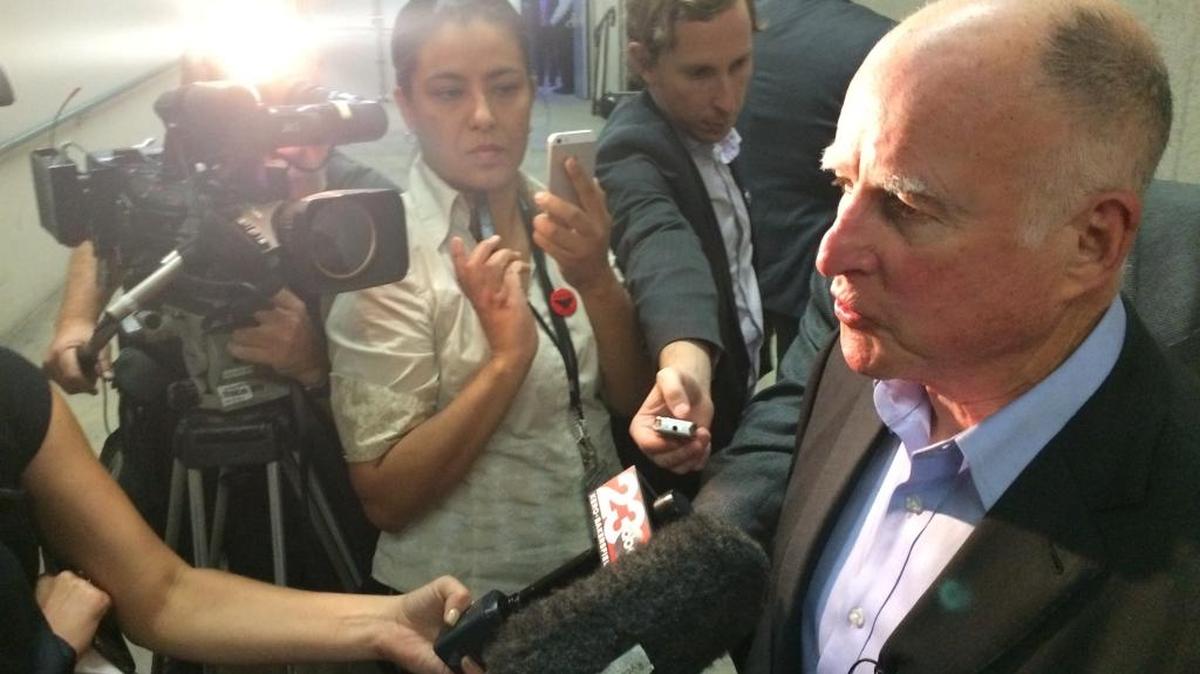 Gov. Jerry Brown speaks to reporters in Bakersfield on May 21, 2016.