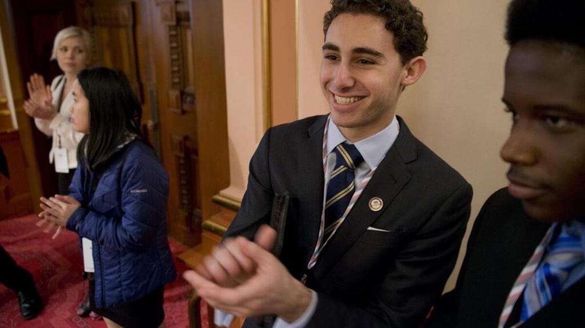 In this 2014 file photo, elected student governor Sam Leichenger of West Los Angeles shows his support of other student government officers at the Senate chambers as part of the California YMCA Youth & Governments Model Legislature & Court program at the Capitol.