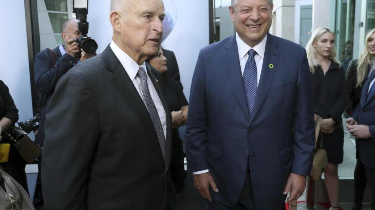 Gov. Jerry Brown, left, and former Vice President Al Gore arrive at the Los Angeles premiere of "An Inconvenient Sequel: Truth to Power" at the Arclight Hollywood on Tuesday, July 25, 2017, in Los Angeles.