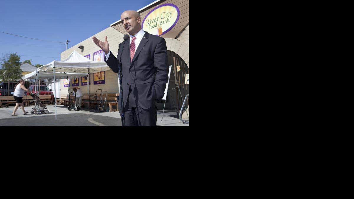 
In this July 31, 2014 file photo, Republican candidate for governor Neel Kashkari discusses issues related to poverty in California during a news conference outside of the River City Food Bank in Sacramento.
