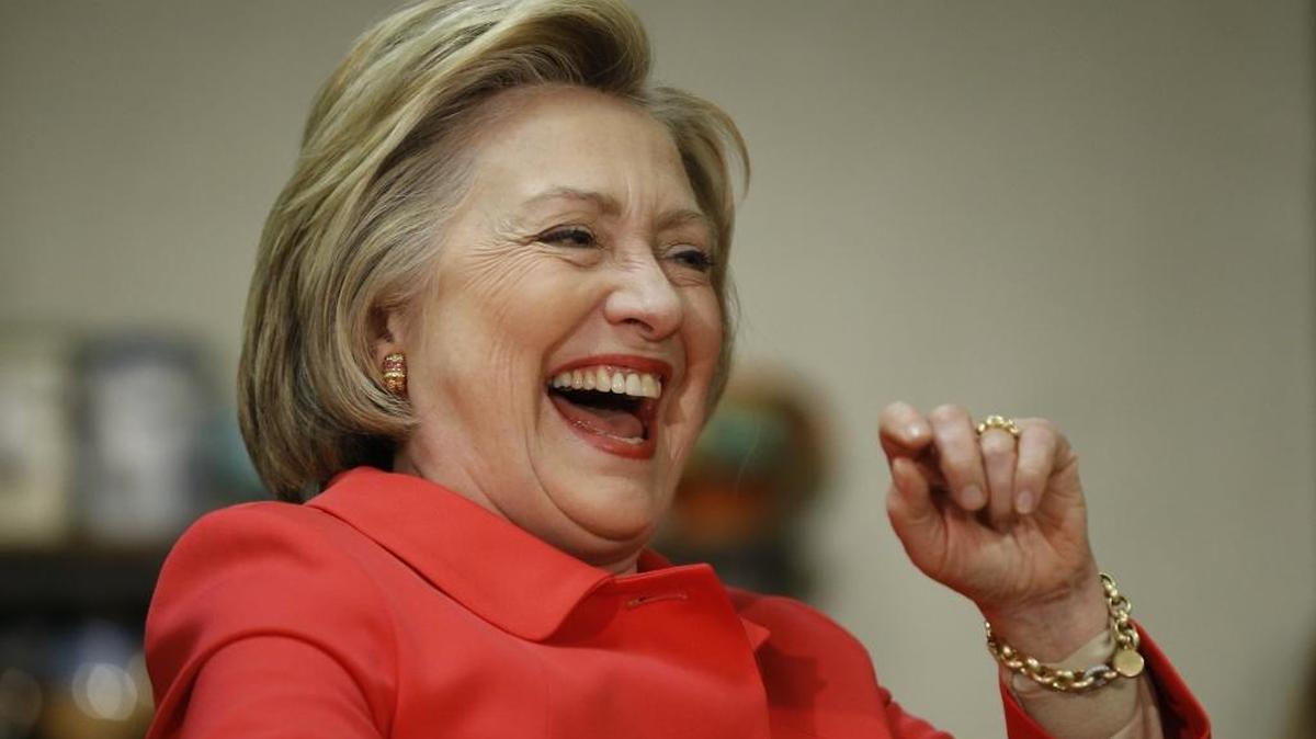 Democratic presidential candidate Hillary Clinton takes part in a discussion with women at a campaign stop Friday at Curds ‘n Whey cafe in Jenkintown, Pa.