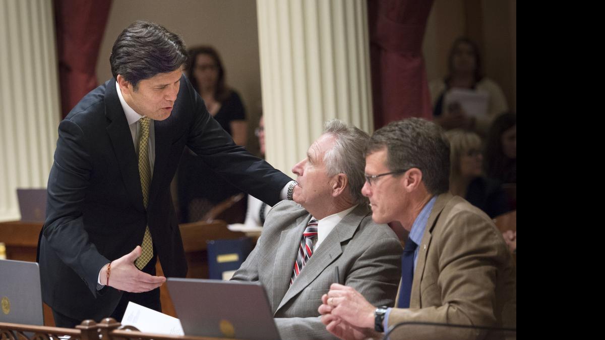 
Senate President Pro Tem Kevin De Leon, D-Los Angeles, talks with Sens. Jim Nielsen, R-Gerber, and Ted Gaines, R-Roseville on Monday, June 14, 2015.
