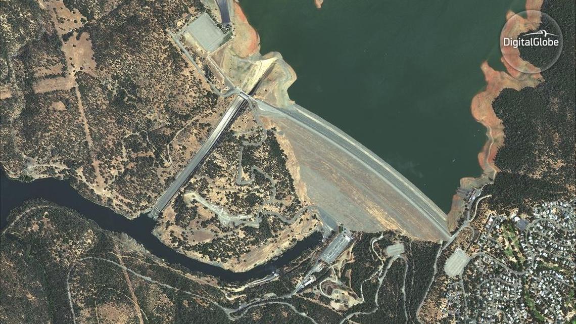 This Aug. 23, 2016, satellite image released by DigitalGlobe and taken by DigitalGlobe's WorldView-2 satellite shows an overview of the Oroville Dam in Oroville, Calif. On Sunday, Feb. 12, 2017, thousands of people were evacuated from counties downstream of the nation's tallest dam amid concerns the spillway could fail and send water roaring downstream.