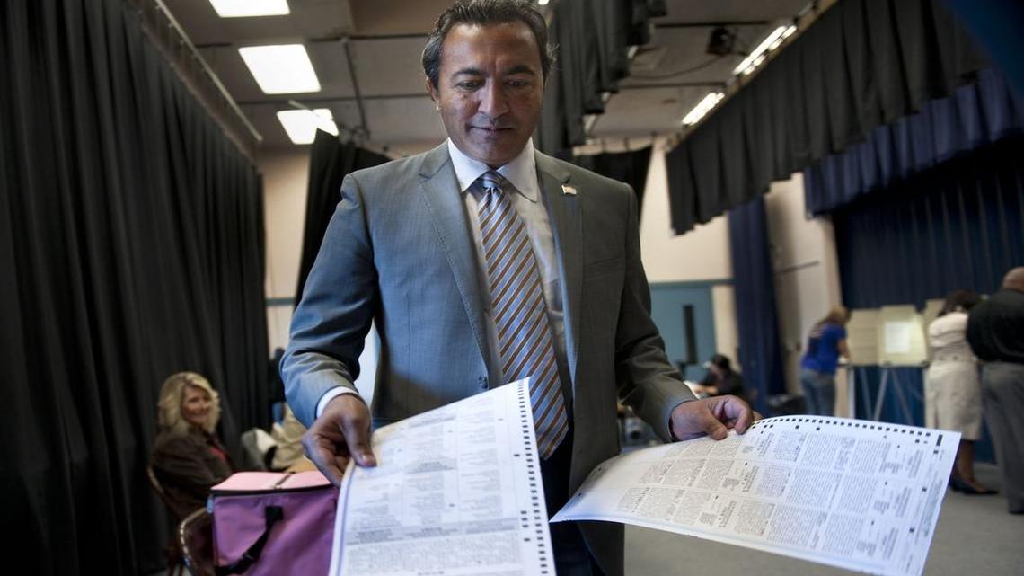
Democratic Rep. Ami Bera is being accused of plagiarizing a business group and the Obama administration for a column about trade that ran under the Elk Grove congressman’s byline in The Sacramento Bee on Sunday. Here, Bera votes at Foulks Ranch Elementary School in Elk Grove in 2012.
