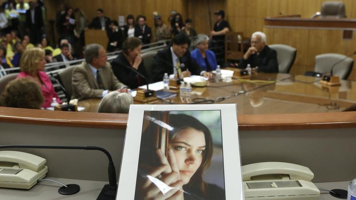 
A portrait of Brittany Maynard, the California woman who moved to Oregon last year to take advantage of the state’s assisted death law, sits on the dais of the Senate Health Committee on March 25, 2015.
